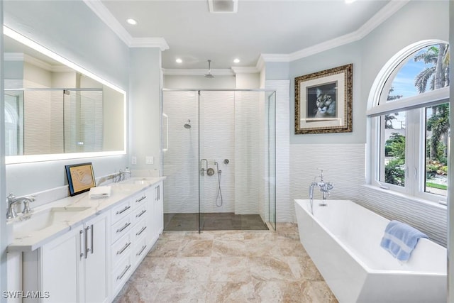 491 Wedge Dr, Naples, FL 34103 - bathroom featuring a stall shower, a soaking tub, double vanity, crown molding, and recessed lighting