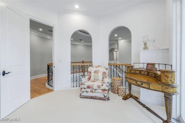 491 Wedge Dr, Naples, FL 34103 - living area with an upstairs landing, recessed lighting, crown molding, arched walkways, and wood finished floors