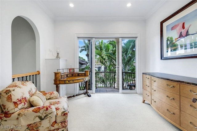 491 Wedge Dr, Naples, FL 34103 - sitting room with light carpet, recessed lighting, crown molding, and arched walkways
