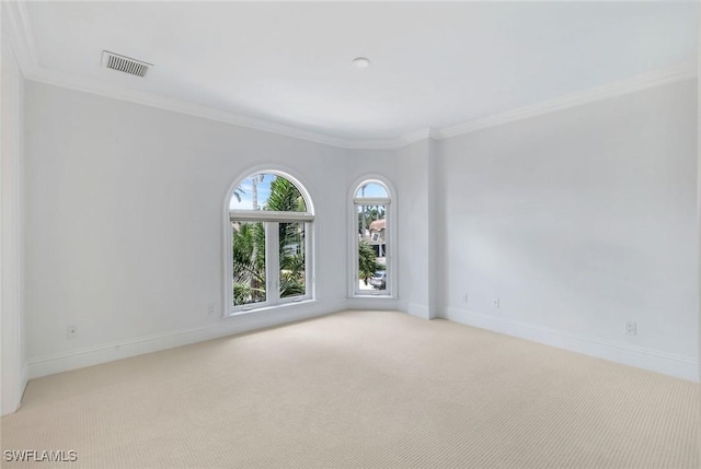 491 Wedge Dr, Naples, FL 34103 - carpeted spare room with ornamental molding and baseboards