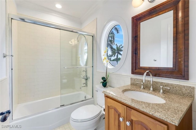 491 Wedge Dr, Naples, FL 34103 - bathroom featuring vanity, crown molding, and combined bath / shower with glass door