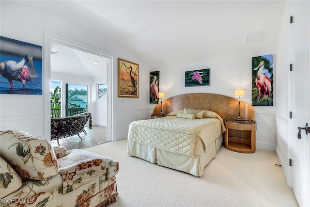 491 Wedge Dr, Naples, FL 34103 - bedroom with access to outside, light carpet, and lofted ceiling