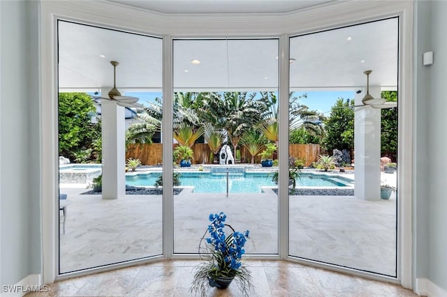 491 Wedge Dr, Naples, FL 34103 - entryway featuring healthy amount of natural light and ceiling fan
