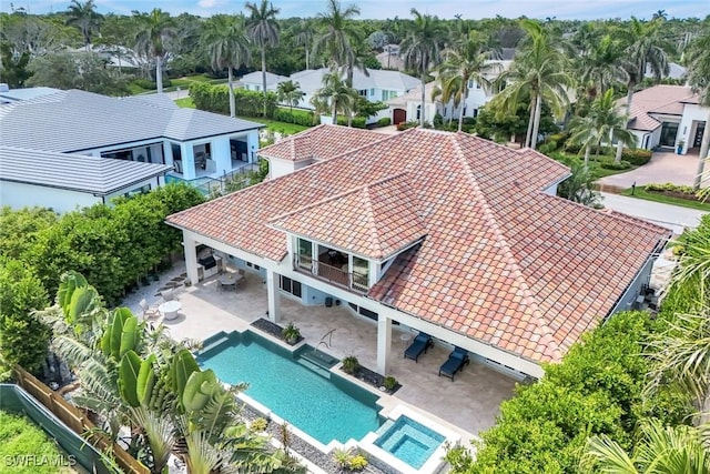 491 Wedge Dr, Naples, FL 34103 - aerial perspective of suburban area with a pool area