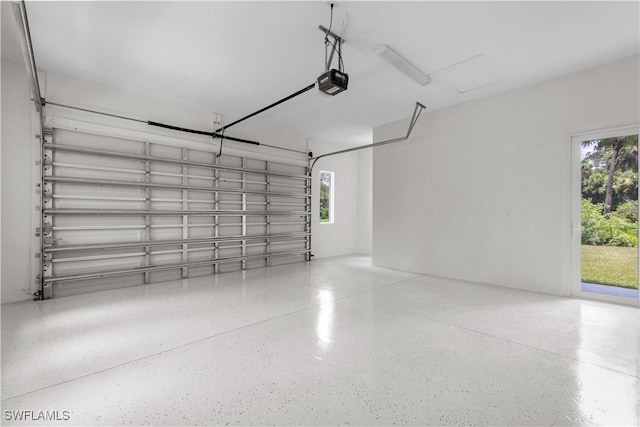 3762 32nd Ave SE, Naples, FL 34117 - garage with a garage door opener