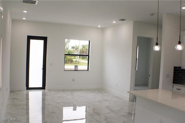 761 Bell Blvd S, Lehigh Acres, FL 33974 - empty room with light marble finish flooring, recessed lighting, baseboards, and a smoke detector