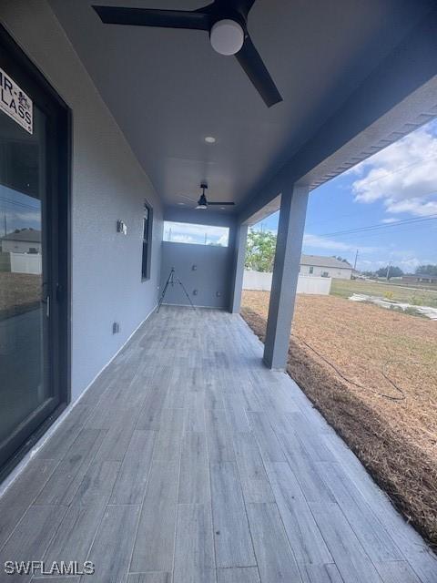 31 Kismet Pkwy E, Cape Coral, FL 33909 - wooden deck with a ceiling fan