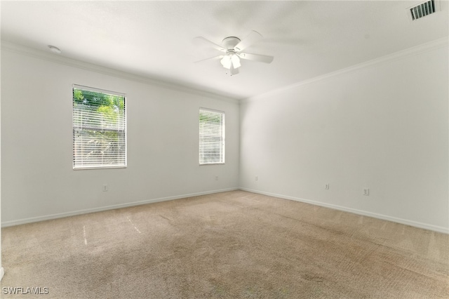 14631 Summer Rose Way, Fort Myers, FL 33919 - empty room featuring ornamental molding, light carpet, ceiling fan, baseboards, and a smoke detector