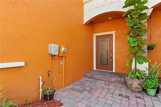 14631 Summer Rose Way, Fort Myers, FL 33919 - doorway to property with stucco siding
