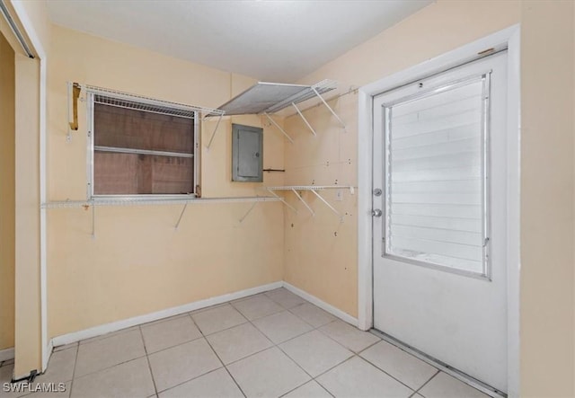 416 Rushmore Ave S, Lehigh Acres, FL 33936 - walk in closet with electric panel and light tile patterned flooring