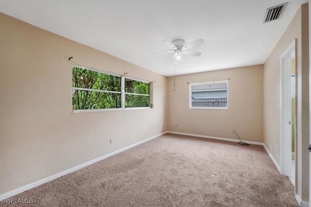 416 Rushmore Ave S, Lehigh Acres, FL 33936 - carpeted empty room with ceiling fan and baseboards