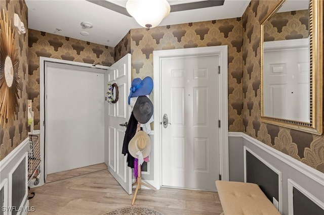 2745 1st St Unit 1602, Fort Myers, FL 33916 - foyer entrance featuring wallpapered walls and light wood-style flooring
