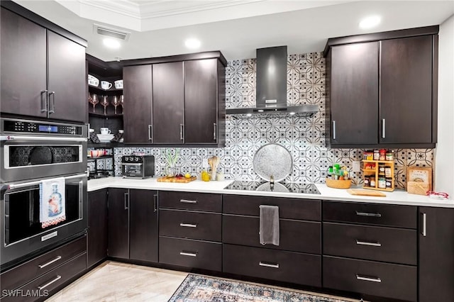 2745 1st St Unit 1602, Fort Myers, FL 33916 - kitchen with wall chimney exhaust hood, black electric cooktop, crown molding, light countertops, and multiple ovens