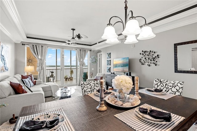 2745 1st St Unit 1602, Fort Myers, FL 33916 - dining room featuring crown molding, a chandelier, a tray ceiling, and ceiling fan