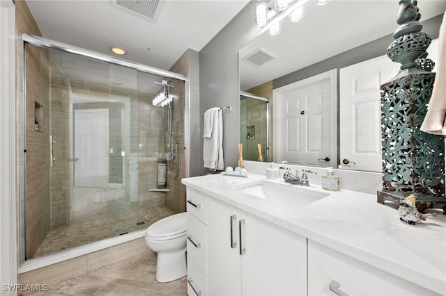 2745 1st St Unit 1602, Fort Myers, FL 33916 - full bath featuring toilet, vanity, and a stall shower