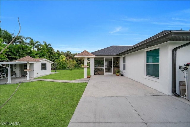 3304 44th St SW, Lehigh Acres, FL 33976 - view of green lawn featuring a patio area