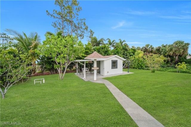 3304 44th St SW, Lehigh Acres, FL 33976 - view of yard featuring a patio