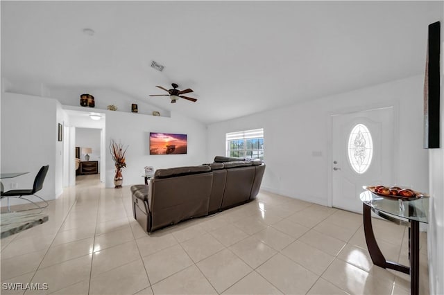 3304 44th St SW, Lehigh Acres, FL 33976 - living room with a ceiling fan, lofted ceiling, and light tile patterned floors