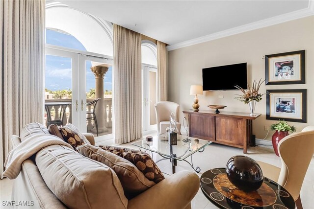 900 5th Ave S Unit 302, Naples, FL 34102 - living area featuring french doors, ornamental molding, and baseboards