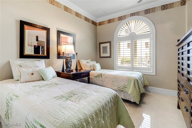 900 5th Ave S Unit 302, Naples, FL 34102 - bedroom featuring baseboards, ornamental molding, and light tile patterned floors