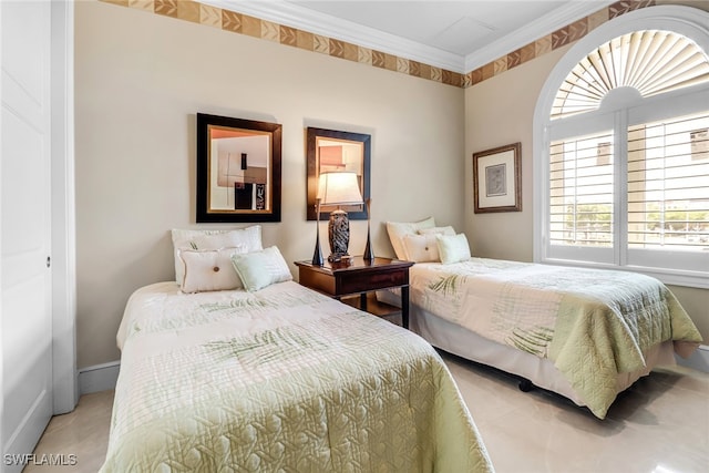 900 5th Ave S Unit 302, Naples, FL 34102 - bedroom featuring crown molding and baseboards