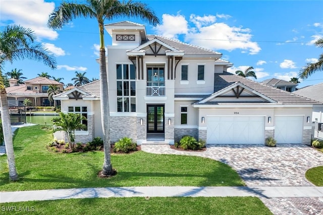 954 Sundrop Ct, Marco Island, FL 34145 - view of front facade featuring french doors, stone siding, and stucco siding