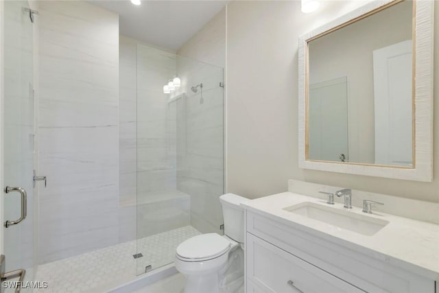 954 Sundrop Ct, Marco Island, FL 34145 - bathroom featuring a stall shower, toilet, and vanity