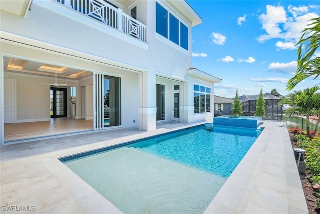 954 Sundrop Ct, Marco Island, FL 34145 - view of swimming pool with a patio and a pool with connected hot tub