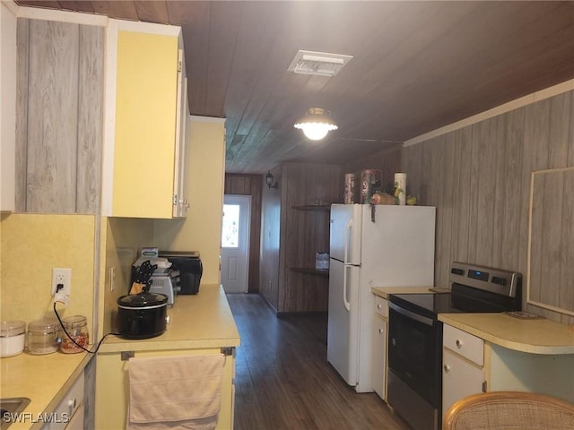 1104 Gulf St, Moore Haven, FL 33471 - kitchen featuring stainless steel range with electric cooktop, wooden ceiling, light countertops, dark wood-style floors, and wood walls