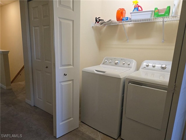 8874 Via Isola Ct, Fort Myers, FL 33966 - laundry room featuring washing machine and dryer and carpet floors