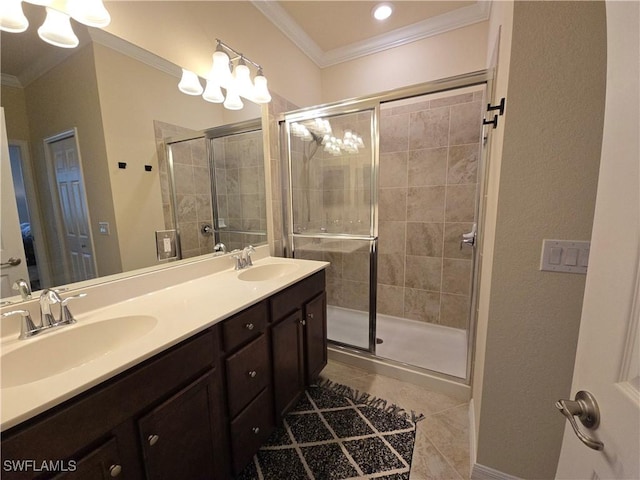 8874 Via Isola Ct, Fort Myers, FL 33966 - full bath with ornamental molding, double vanity, a stall shower, and tile patterned flooring