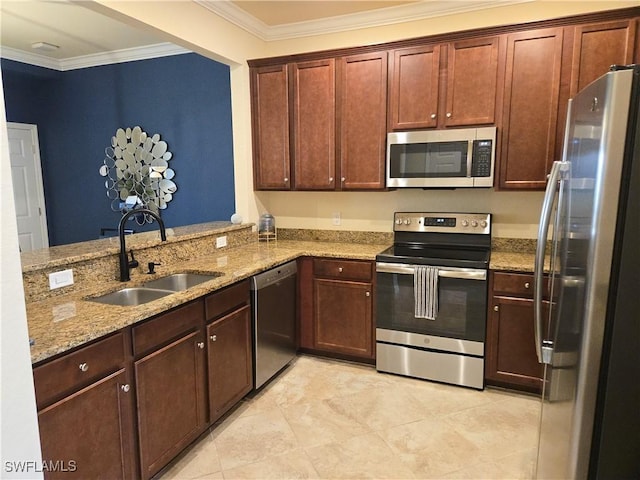 8874 Via Isola Ct, Fort Myers, FL 33966 - kitchen featuring stainless steel appliances, ornamental molding, light stone counters, light tile patterned flooring, and a peninsula
