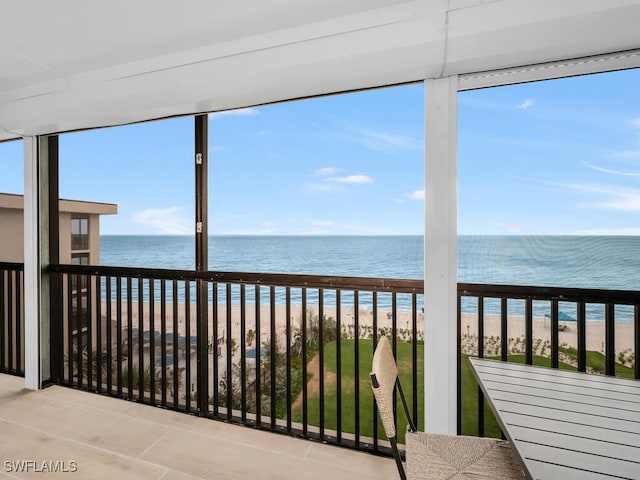 9375 Gulf Shore Dr Unit 601, Naples, FL 34108 - unfurnished sunroom featuring a water view
