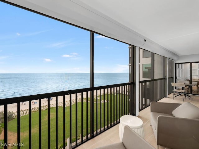 9375 Gulf Shore Dr Unit 601, Naples, FL 34108 - sunroom / solarium with a water view and healthy amount of natural light