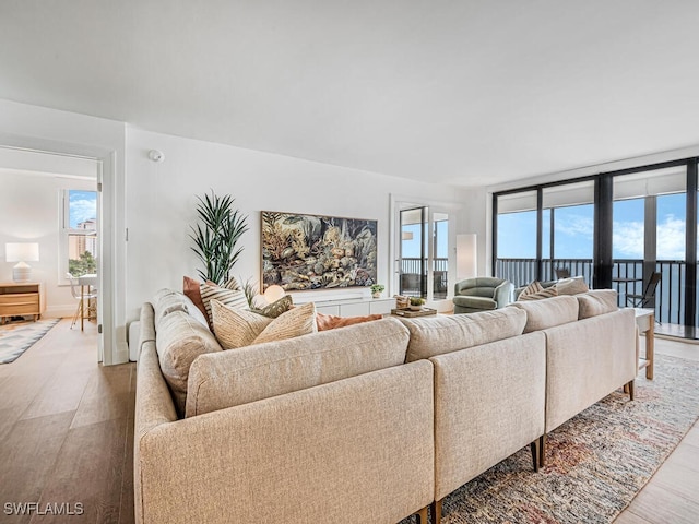 9375 Gulf Shore Dr Unit 601, Naples, FL 34108 - living room featuring light wood-style flooring