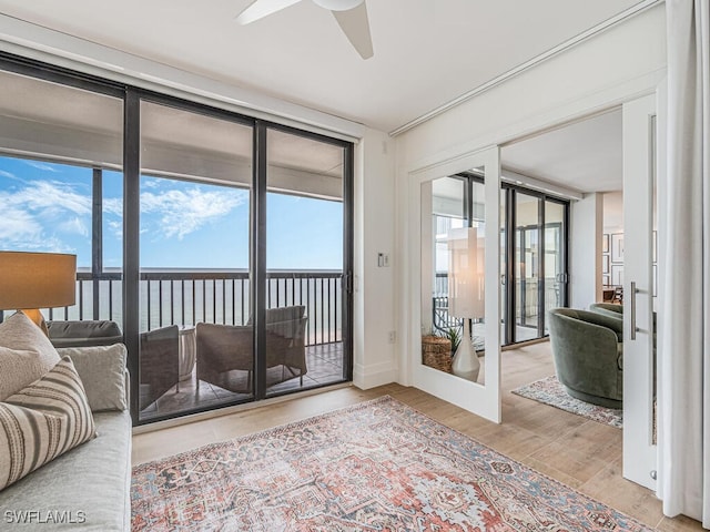 9375 Gulf Shore Dr Unit 601, Naples, FL 34108 - sunroom / solarium with a water view and french doors