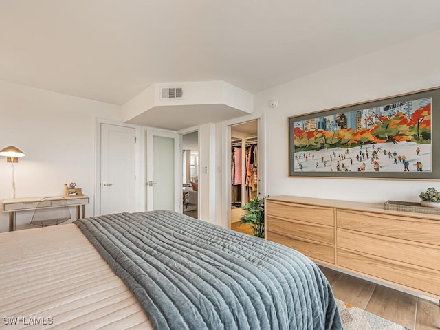 9375 Gulf Shore Dr Unit 601, Naples, FL 34108 - bedroom with wood finished floors and a spacious closet