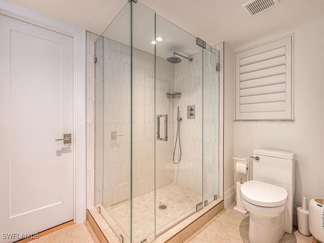 9375 Gulf Shore Dr Unit 601, Naples, FL 34108 - bathroom with toilet, a shower stall, and tile patterned floors