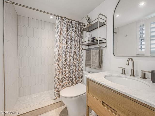9375 Gulf Shore Dr Unit 601, Naples, FL 34108 - bathroom featuring a tile shower, toilet, vanity, and recessed lighting