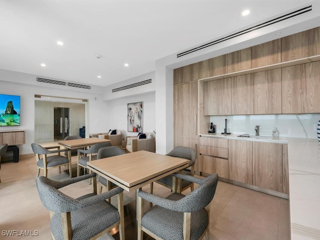 9375 Gulf Shore Dr Unit 601, Naples, FL 34108 - dining area featuring recessed lighting, light tile patterned floors, and wet bar