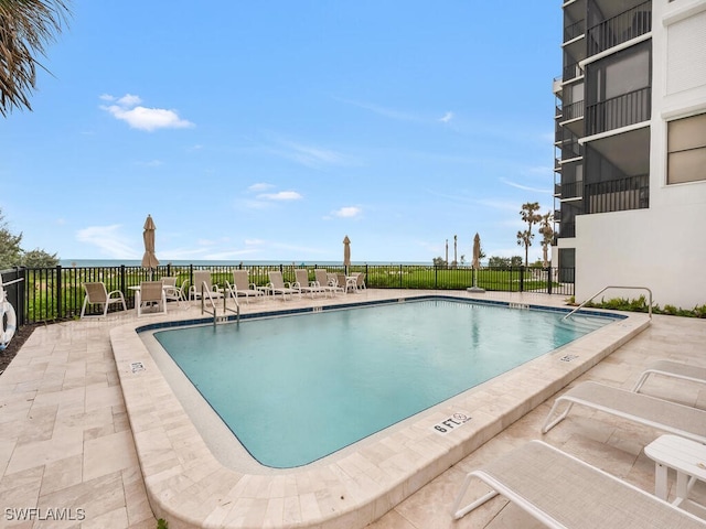 9375 Gulf Shore Dr Unit 601, Naples, FL 34108 - community pool with a patio area