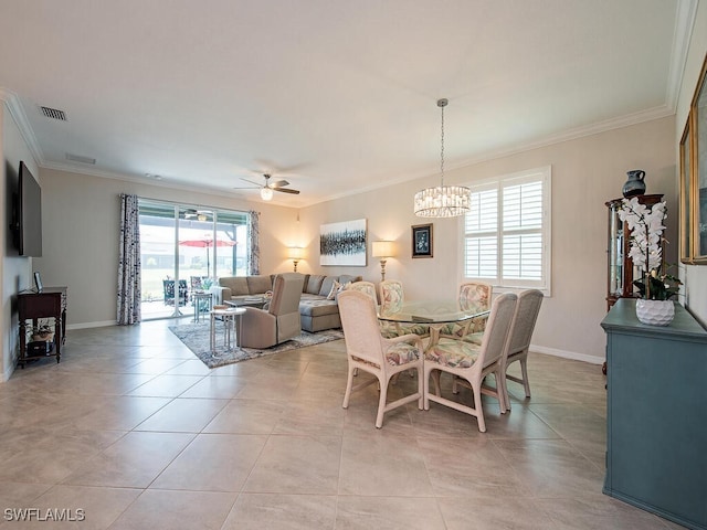 2174 Clementine St, Naples, FL 34120 - dining room featuring crown molding, a chandelier, ceiling fan, light tile patterned flooring, and baseboards