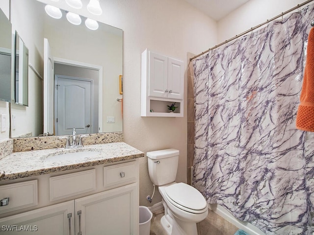 2174 Clementine St, Naples, FL 34120 - bathroom with toilet, vanity, and curtained shower
