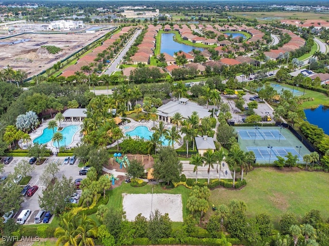 2174 Clementine St, Naples, FL 34120 - aerial view of property's location featuring a pool and a large body of water