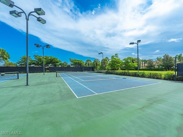 2174 Clementine St, Naples, FL 34120 - view of tennis court featuring community basketball court