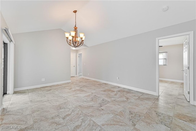 14938 Randolph Dr, Fort Myers, FL 33905 - spare room featuring a chandelier, vaulted ceiling, and baseboards