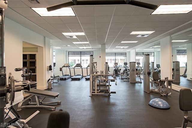 1030 3rd Ave S Unit 406, Naples, FL 34102 - workout area with a paneled ceiling