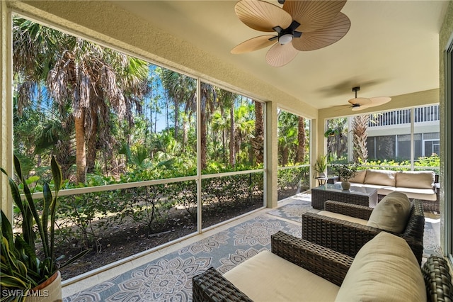 1630 Tarpon Bay Dr S Unit 102, Naples, FL 34119 - sunroom / solarium featuring a ceiling fan and an outdoor hangout area