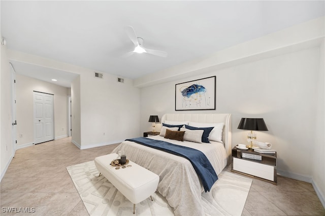 1630 Tarpon Bay Dr S Unit 102, Naples, FL 34119 - bedroom with light tile patterned floors, baseboards, and ceiling fan