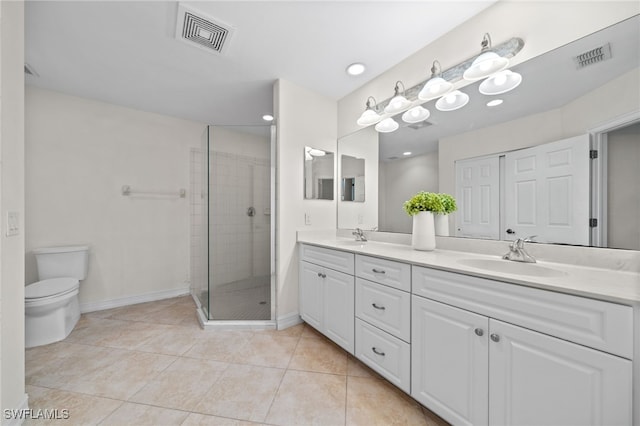 1630 Tarpon Bay Dr S Unit 102, Naples, FL 34119 - full bath featuring double vanity, a stall shower, tile patterned flooring, toilet, and baseboards